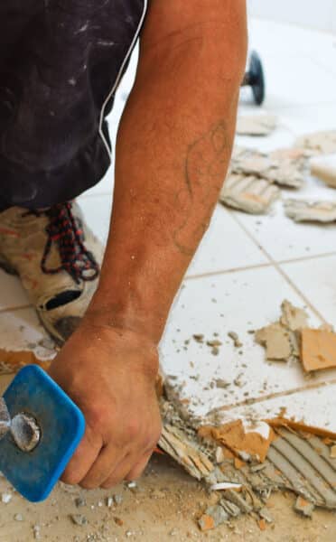 the renovation of a bathroom renovation uind by a construction worker